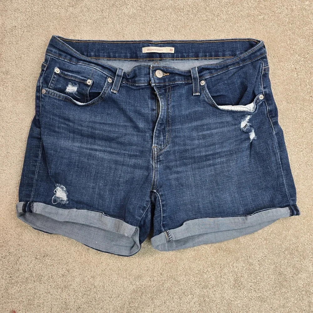 Levi's Mid Length Women's‎ Jean Shorts Size 33 Blue Cuffed Distressed